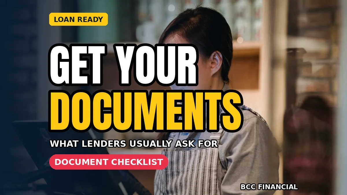 Business owner organising documents needed for business loan application in a labelled folder before meeting a lender