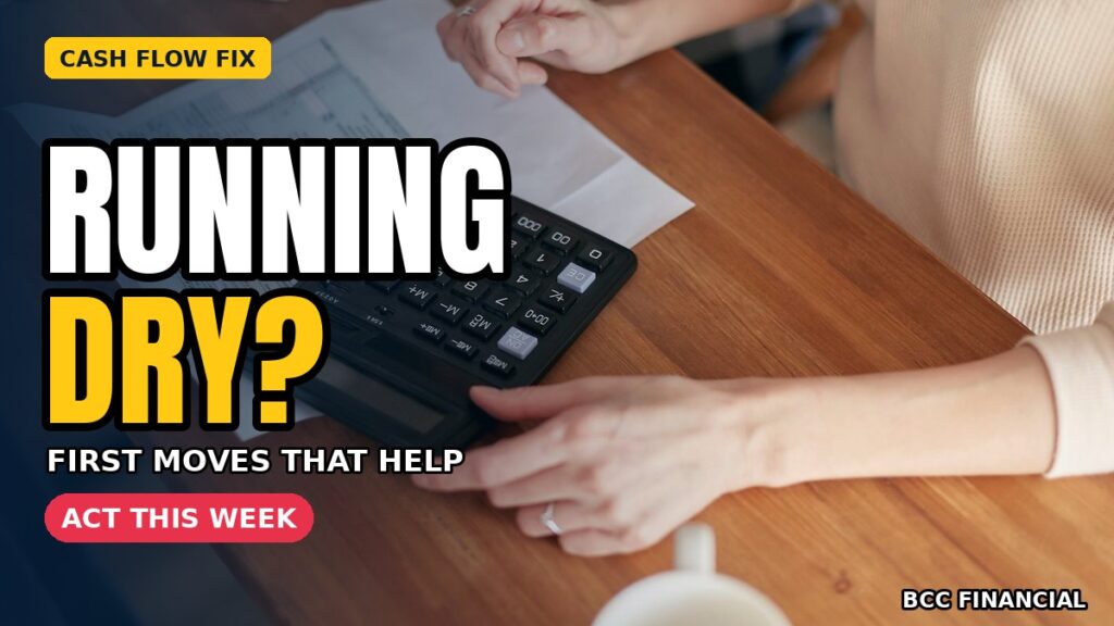 Cash flow problems: a person using a calculator to check figures while reviewing documents