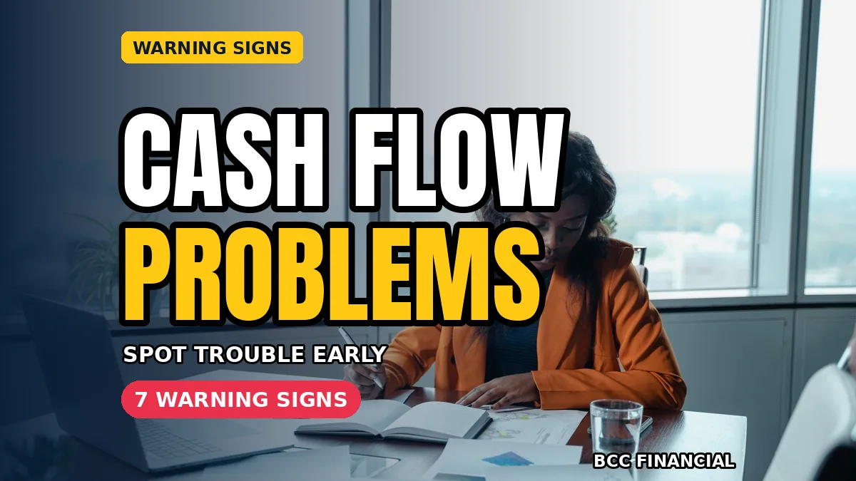 Cash flow problems: a businesswoman in an orange blazer analysing documents at her office desk